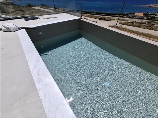 ΠΙΣΙΝΑ ΜΠΕΤΟΝ ΜΕ ΥΠΕΡΧΕΙΛΗΣΗ ΛΑΙΝΕΡ ΚΑΙ ΥΔΡΟΜΑΣΑΖ ΣΤΗΝ ΚΑΡΥΣΤΟ - ΕΡΓΟ 65 7