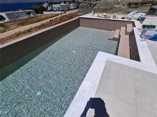 ΠΙΣΙΝΑ ΜΠΕΤΟΝ ΜΕ ΥΠΕΡΧΕΙΛΗΣΗ ΛΑΙΝΕΡ ΚΑΙ ΥΔΡΟΜΑΣΑΖ ΣΤΗΝ ΚΑΡΥΣΤΟ - ΕΡΓΟ 65 6